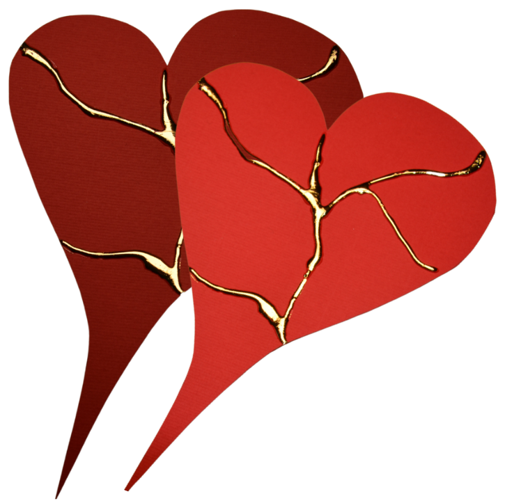 Kintsugi-Herzen: 2 rote Herzen mit goldenen Adern als Symbol für Kintsugi